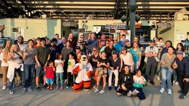 Troy LG Energy Solution Michigan employees attending a community Tigers game.