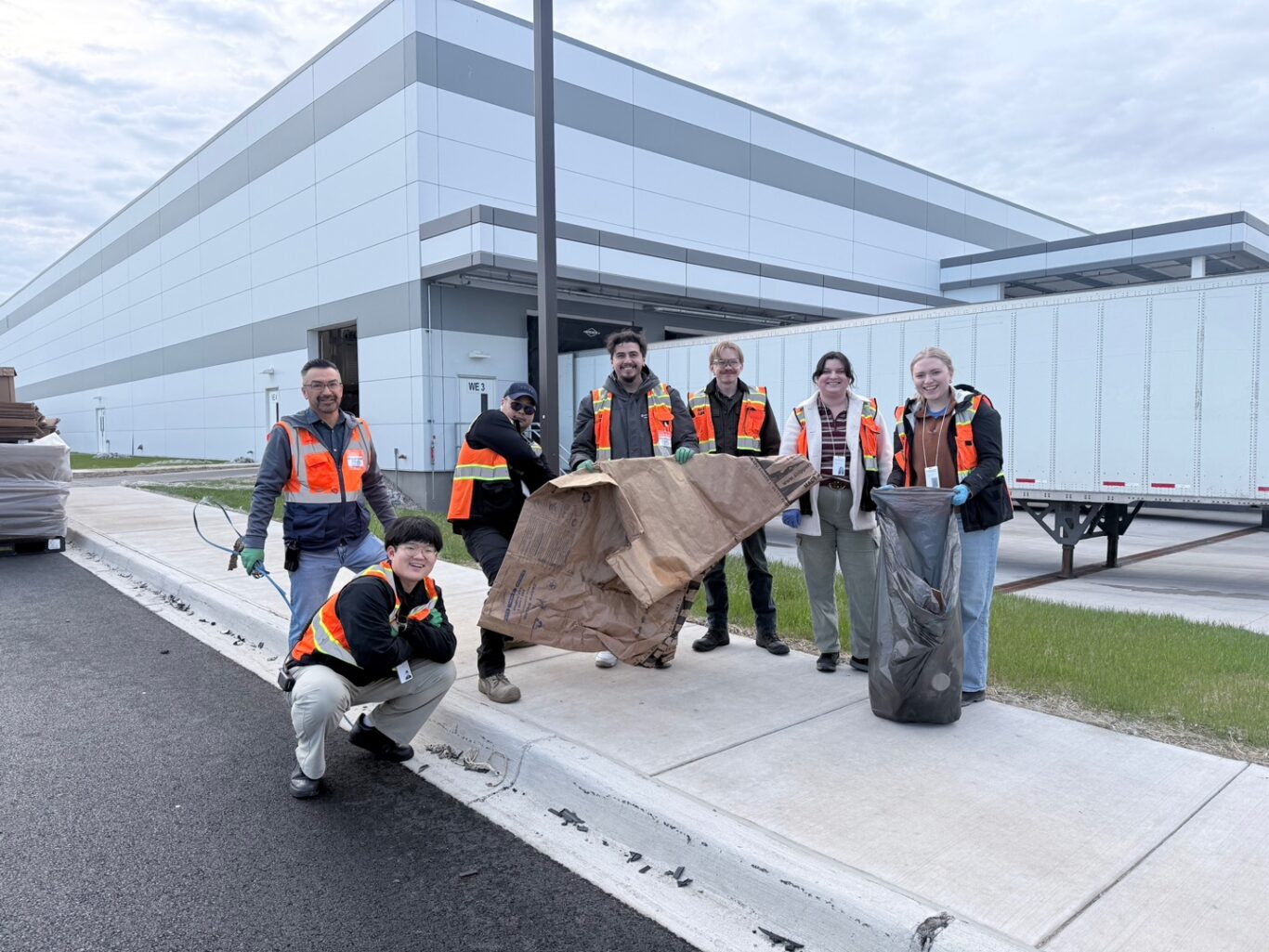 Photo of team members in Holland, MI during cleanup. 